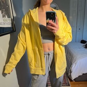 George large yellow zip up